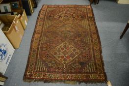 An old Persian rug, 190cm x 120cm.