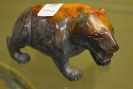 A Chinese carved hard stone model of a bear.