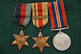 A set of three military medals.