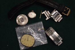 Various watch parts.