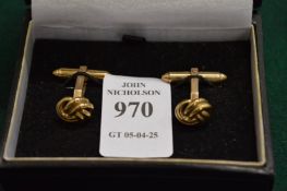 A pair of 9ct gold knot cufflinks.