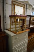 A white painted six drawer bedroom chest and other furniture.