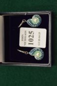 A pair of sterling silver, enamel and cultured pearl shell shaped earrings.