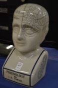 A reproduction pottery phrenology head.