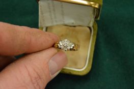 An 18ct gold and diamond ring.