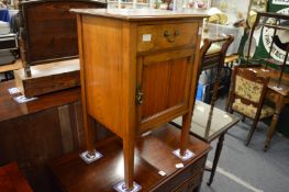 A mahogany pot cupboard.