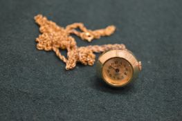 A pendant watch.