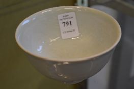 A Chinese small blanc de chine bowl with incised decoration.