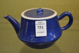 A Chinese blue glazed small teapot.