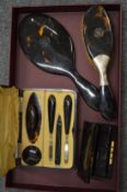 Tortoiseshell items to include manicure set.