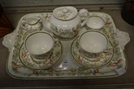 An Adderleys china tea for two set with tray, one cup cracked, other cup repaired.