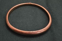 A gilt metal articulated necklace.