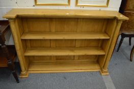 A pine open bookcase.