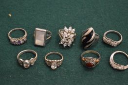Nine various decorative silver rings.