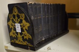 A Victorian brass mounted book slide together with a set of Shakespeare's works.