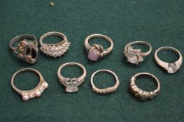 Nine various decorative silver rings.