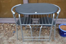 A modern metal bistro table and pair of chairs.