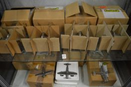 A collection of die-cast metal model aeroplanes.