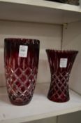 Two ruby tinted cut glass vases.