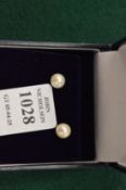 A pair of 9ct gold and cultured pearl ear studs.