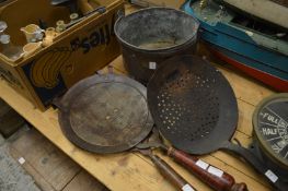 Two chapati fryers, long handled skimmer and a copper cooking pan.