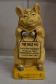 Novelty cast iron piggy bank.