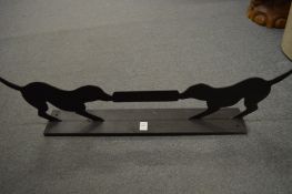 A metal doggy boot scraper.