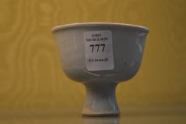 A small Chinese blanc de chine stem cup.