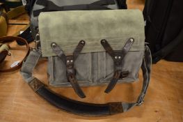 A canvas and leather holdall.