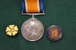 A WWI medal awarded to F17209 W E Penfold AM1RNAS and two enamel badges.