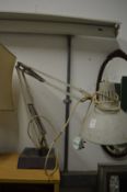 An early angle poise lamp.