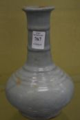 A Chinese celadon glazed bottle vase.