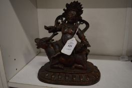 Chinese bronze Buddha seated on an ox.
