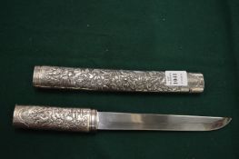 A white metal mounted Japanese tanto.