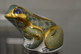 A Royal Crown Derby model of a frog.