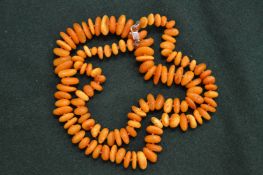 An amber bead necklace.