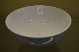 A Chinese pale celadon bowl with incised decoration.