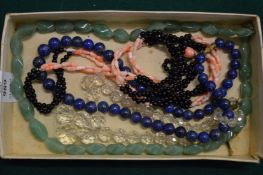 Decorative bead necklaces etc.