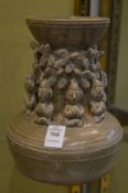 An unusual Chinese vase with moulded figural decoration.