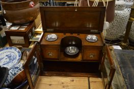 A smokers oak table top cabinet.