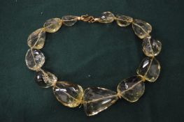 A decorative chunky bead necklace.