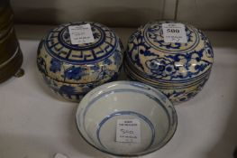 A pair of Chinese blue and white porcelain circular boxes and covers together with a similar bowl.