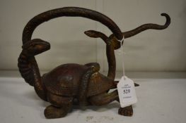 A Chinese bronze snake attacking a tortoise.