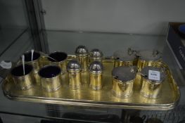 Four sets of silver condiments.