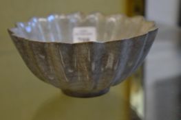 A Chinese celadon glazed petal shaped bowl.