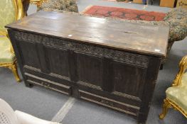 An 18th century oak coffer/mule chest.