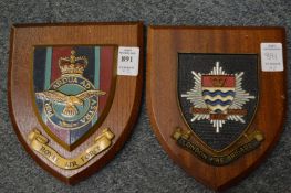 Two shield shaped plaques for The Royal Air Force and London Fire Brigade.
