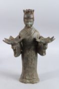 A CHINESE ARCHAIC BRONZE FIGURAL CANDLESTICKS. 13ins high.