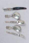 A GEORG JENSEN STERLING SILVER KNIFE, FORK AND SPOON and a pair of similar spoons (5).