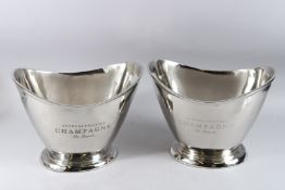 A PAIR OF CHAMPAGNE SHAPED WINE COOLERS. 14ins high.